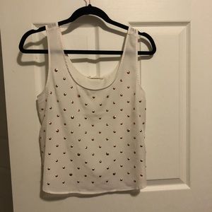 White sheer tank with rose gold button detail